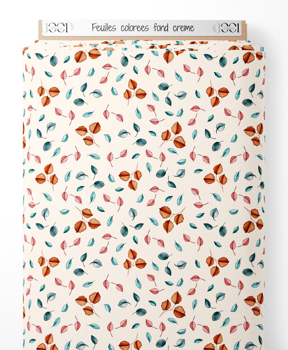 Tissu - Feuilles colorées sur fond crème