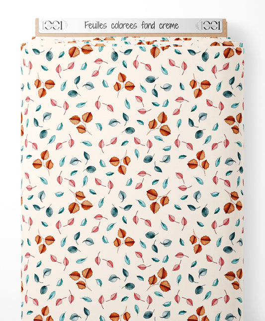 Tissu - Feuilles colorées sur fond crème