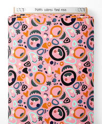 Tissu - Motifs colorés sur fond rose