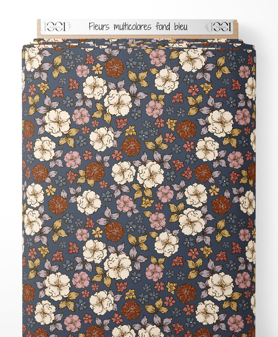 Tissu - Fleurs multicolores sur fond bleu