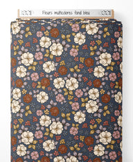 Tissu - Fleurs multicolores sur fond bleu
