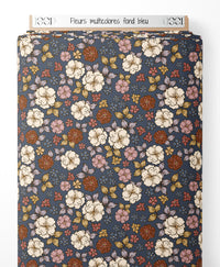 Tissu - Fleurs multicolores sur fond bleu