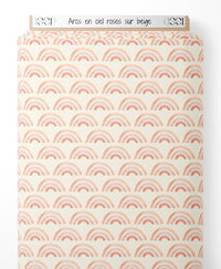 Tissu - Arcs-en-ciel roses sur beige