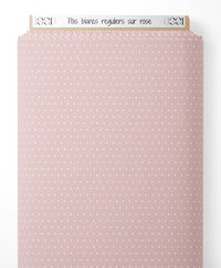 Tissu - Pois blancs réguliers sur rose