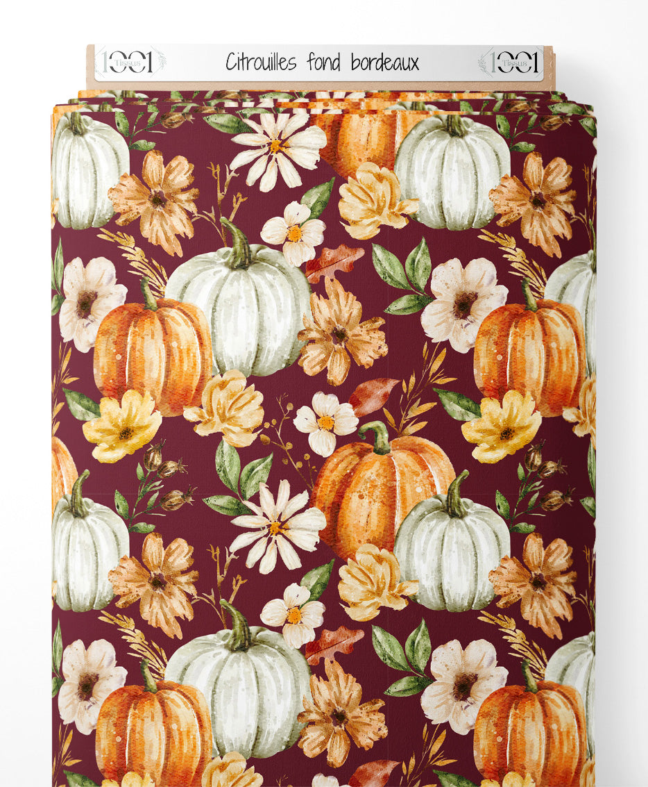 Tissu - Citrouilles sur fond bordeaux