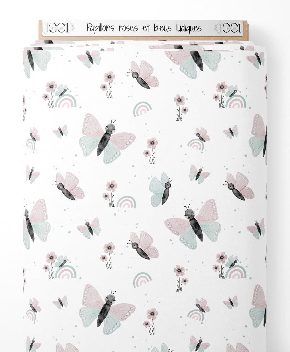 Tissu - Papillons roses et bleus ludiques