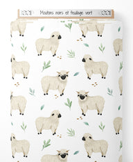 Tissu - Moutons noirs et feuillage vert