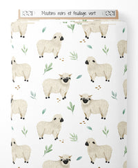 Tissu - Moutons noirs et feuillage vert
