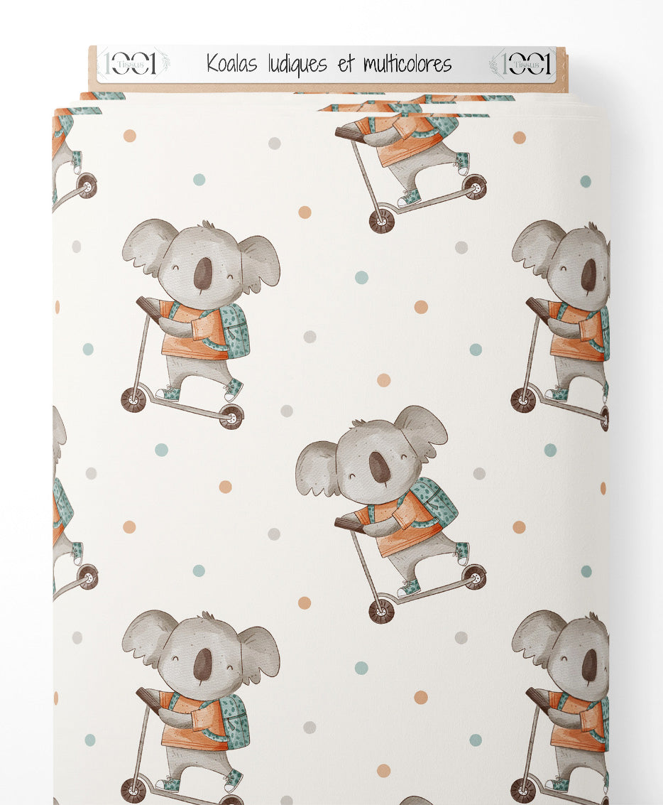 Tissu - Koalas ludiques et multicolores