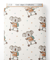 Tissu - Koalas ludiques et multicolores
