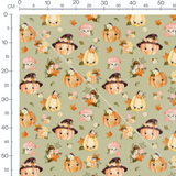Tissu - Citrouilles joyeuses sur vert