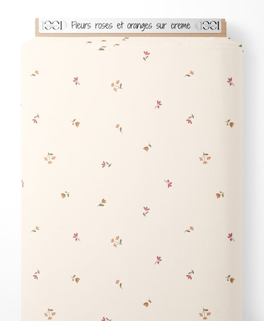 Tissu - Fleurs roses et oranges sur crème