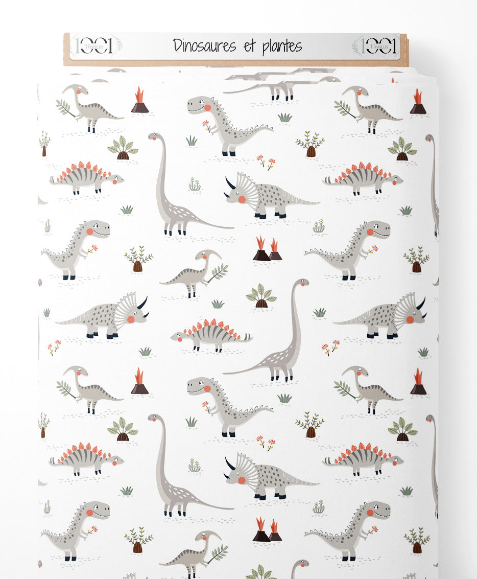 Tissu - Dinosaures et plantes sur fond