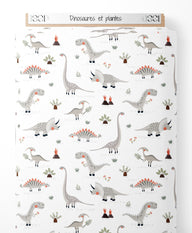 Tissu - Dinosaures et plantes sur fond