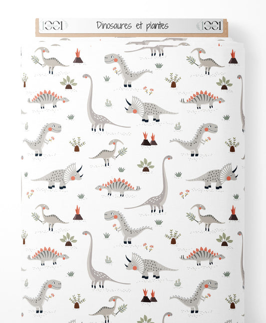 Tissu - Dinosaures et plantes sur fond