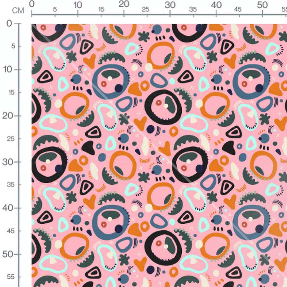Tissu - Motifs colorés sur fond rose