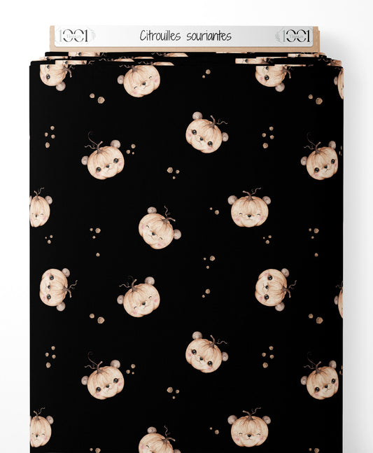 Tissu - Citrouilles souriantes sur fond
