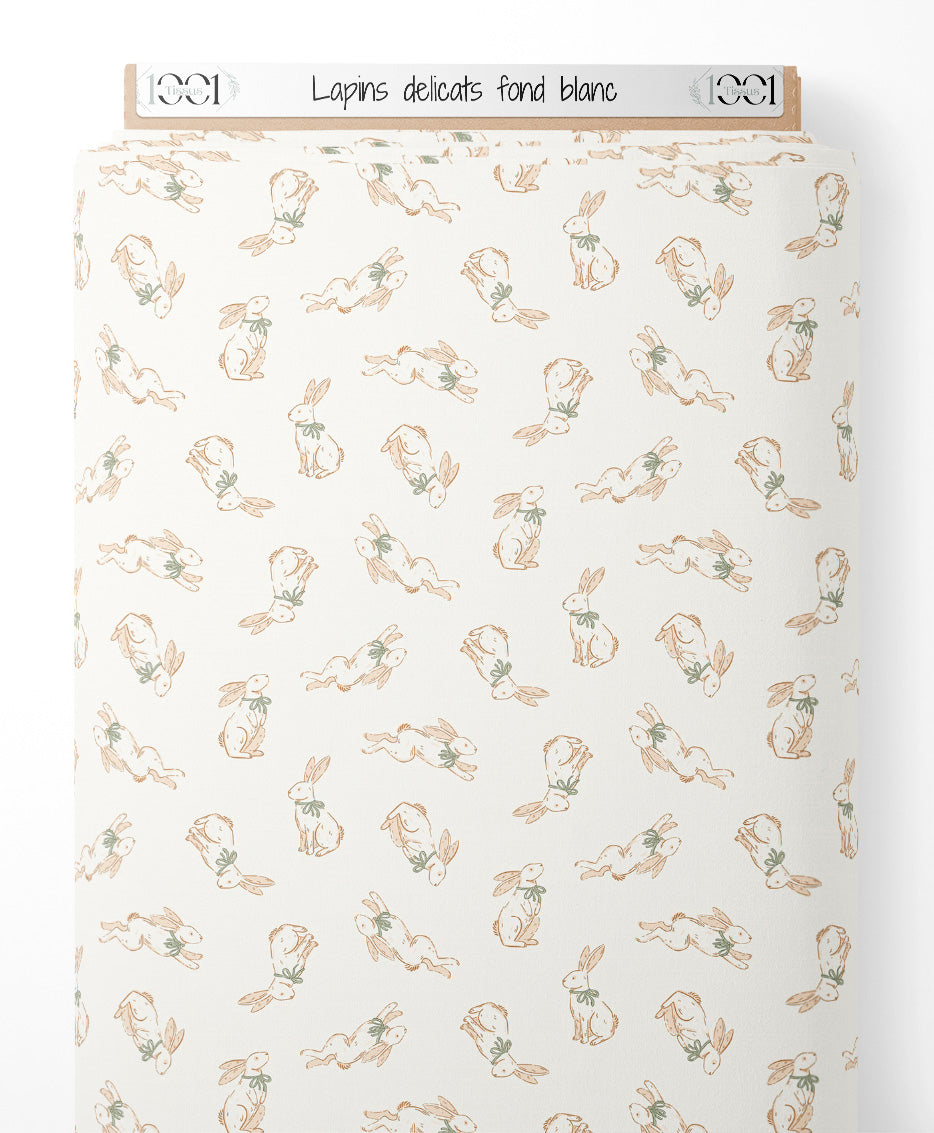Tissu - Lapins délicats sur fond blanc