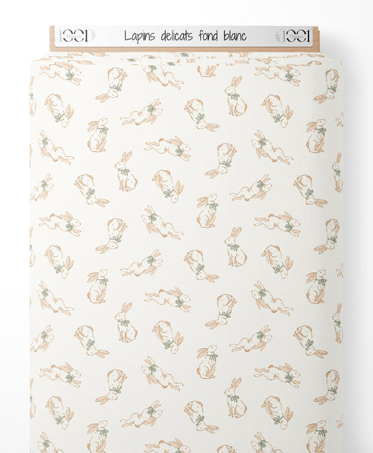 Tissu - Lapins délicats sur fond blanc