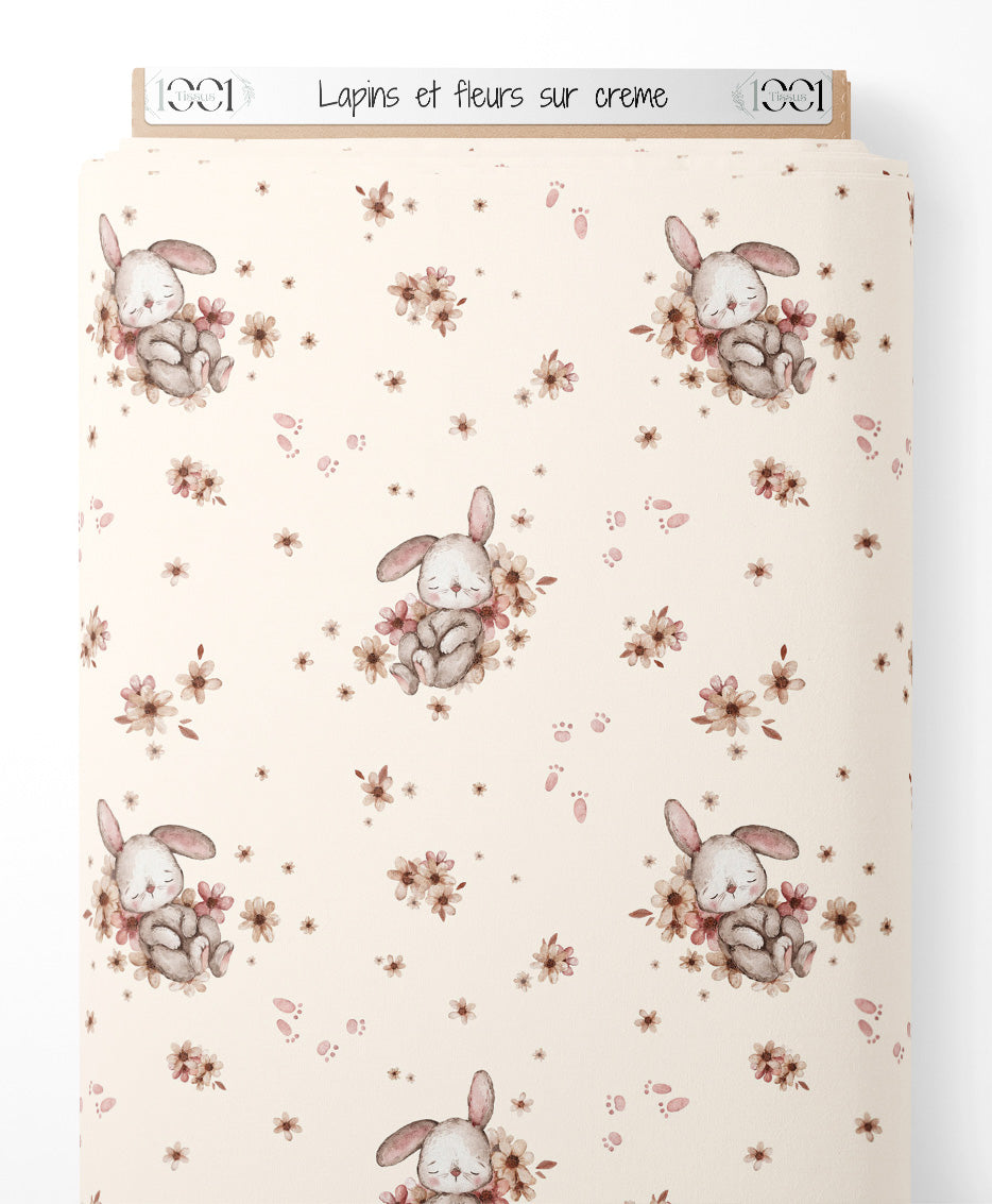 Tissu - Lapins et fleurs sur crème