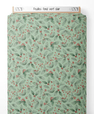 Tissu - Feuilles sur fond vert clair
