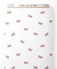 Tissu - Noeuds roses sur blanc