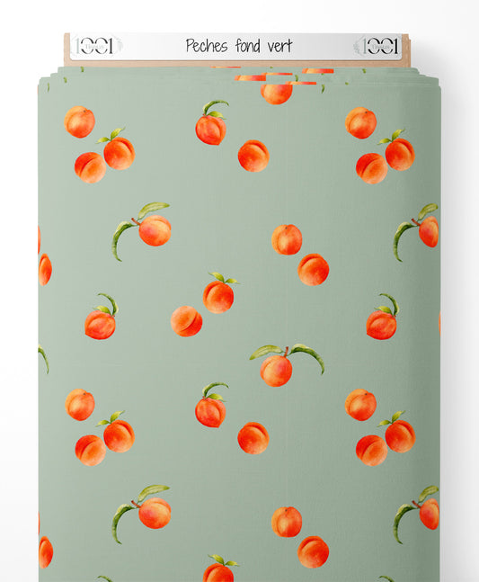 Tissu - Pêches sur fond vert