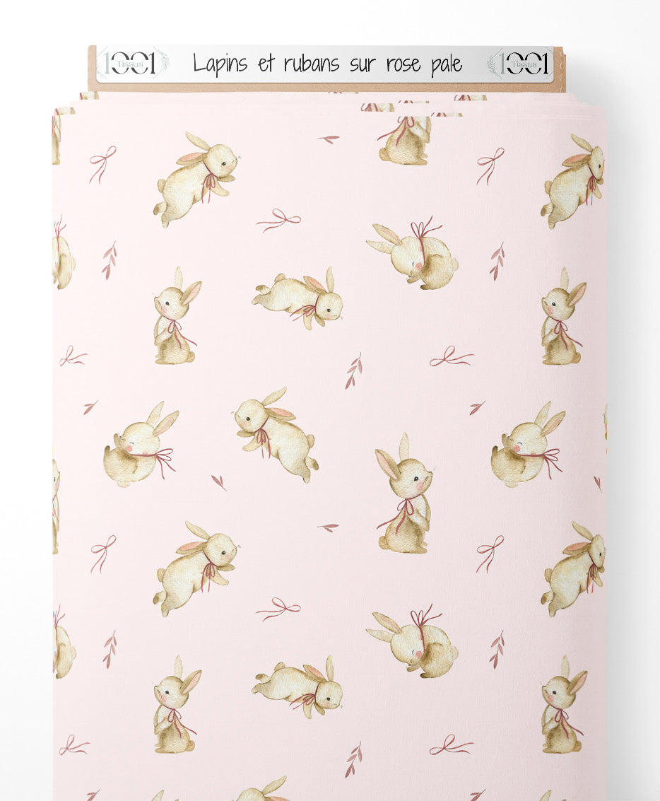 Tissu - Lapins et rubans sur rose pâle