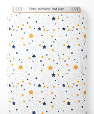 Tissu - Étoiles multicolores sur fond blanc