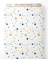 Tissu - Étoiles multicolores sur fond blanc