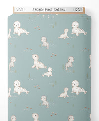 Tissu - Phoques blancs sur fond bleu