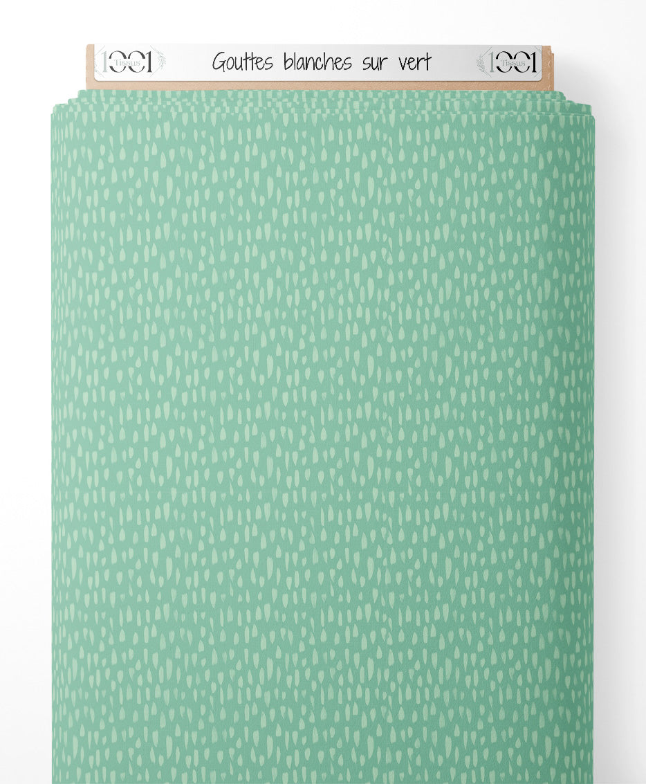 Tissu - Gouttes blanches sur vert
