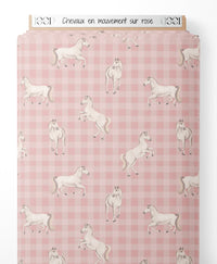 Tissu - Chevaux en mouvement sur rose