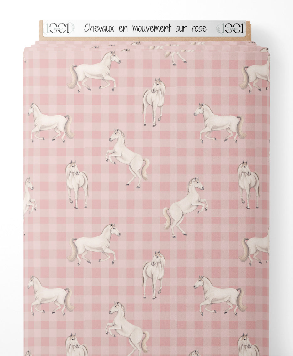 Tissu - Chevaux en mouvement sur rose
