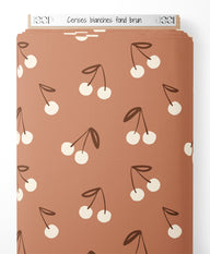 Tissu - Cerises blanches sur fond brun