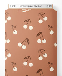 Tissu - Cerises blanches sur fond brun