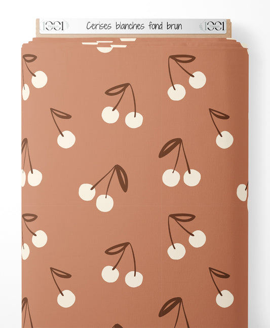 Tissu - Cerises blanches sur fond brun
