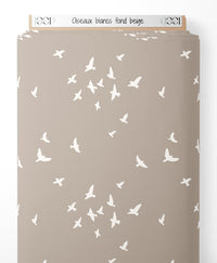 Tissu - Oiseaux blancs sur fond beige