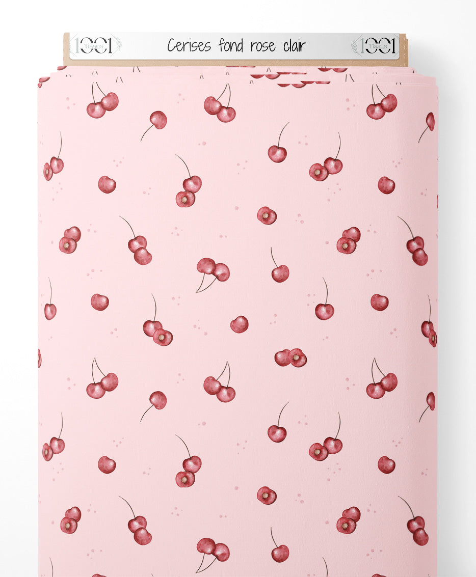 Tissu - Cerises sur fond rose clair