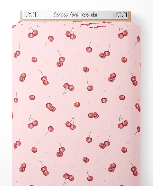 Tissu - Cerises sur fond rose clair