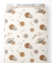 Tissu - Univers souriant sur crème