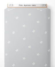 Tissu - Étoiles dispersées claires