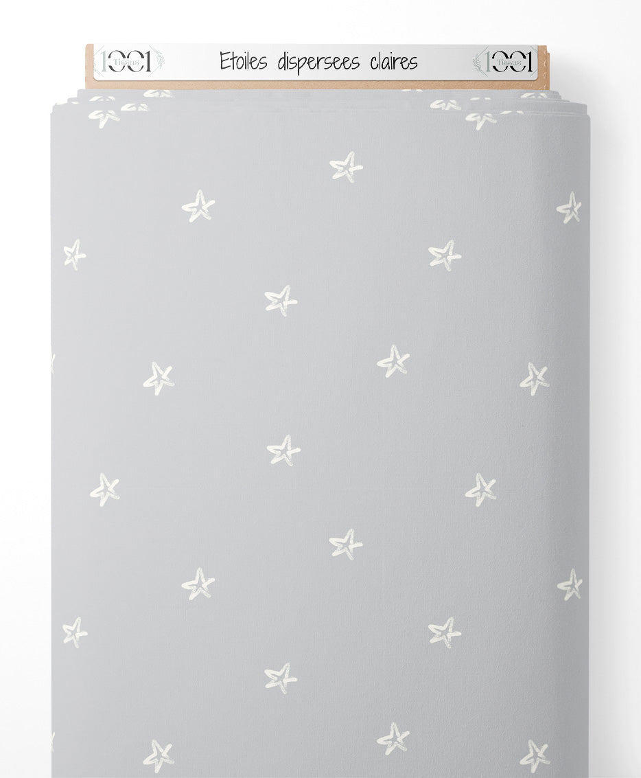 Tissu - Étoiles dispersées claires