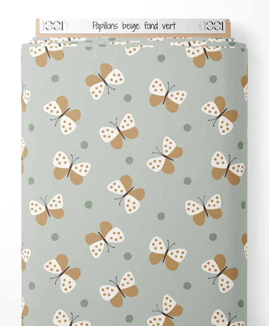 Tissu - Papillons beige sur fond vert