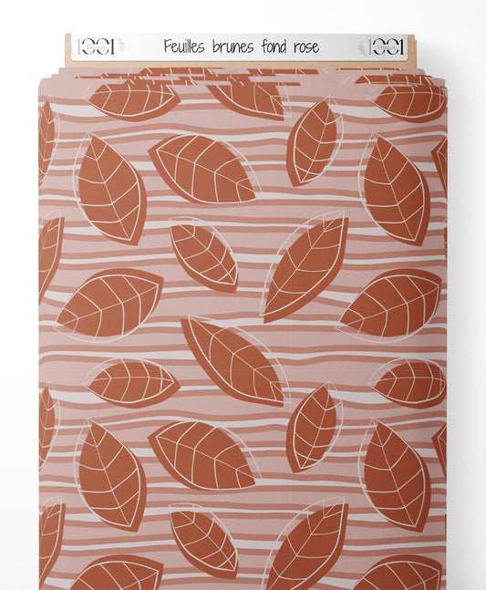 Tissu - Feuilles brunes sur fond rose