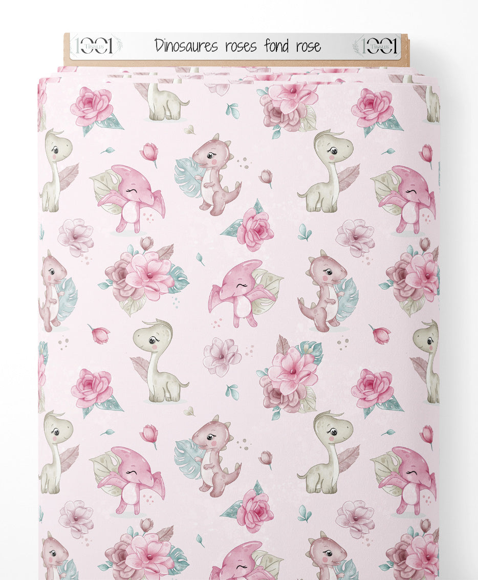Tissu - Dinosaures roses sur fond rose