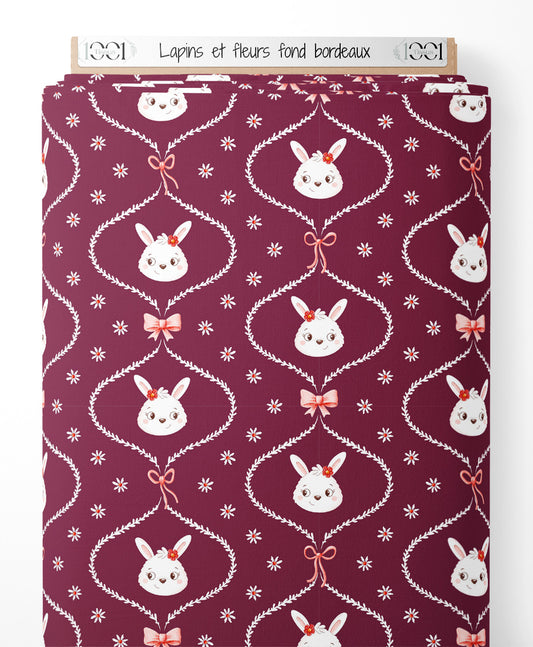 Tissu - Lapins et fleurs sur fond bordeaux