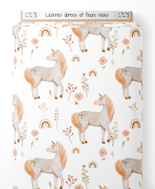 Tissu - Licornes dorées et fleurs roses