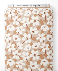 Tissu - Fleurs blanches sur beige clair