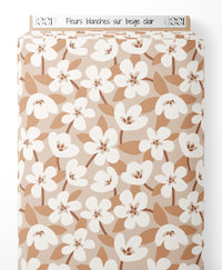 Tissu - Fleurs blanches sur beige clair